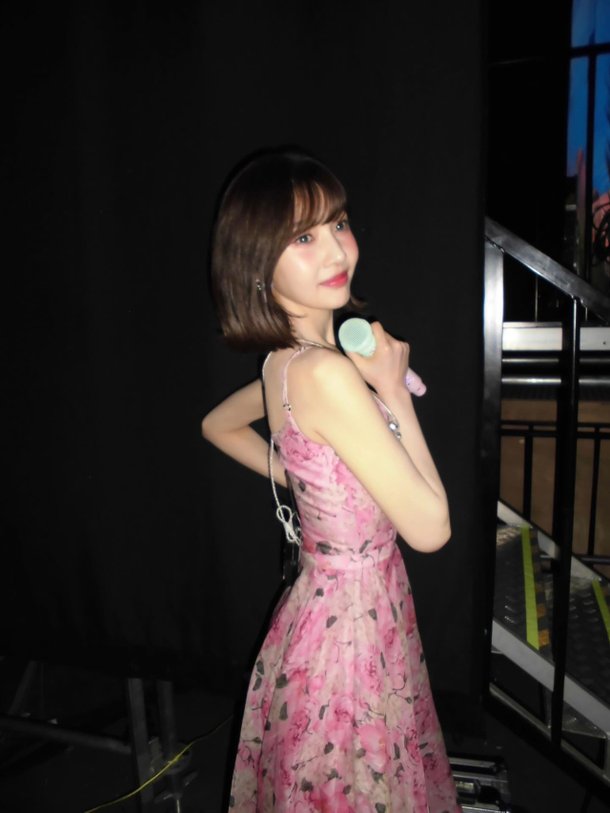 Joy shows off her Barbie doll figure with a barely visible back