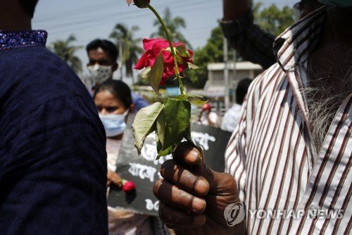 BANGLADESH FACTORY DISASTER ANNIVERSARY : 네이트 뉴스